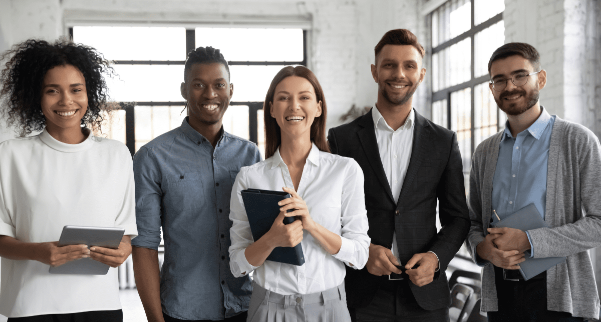 Adherent (formerly Compliance & Risks). Professionals in office setting - concept for compliance trends September 2024