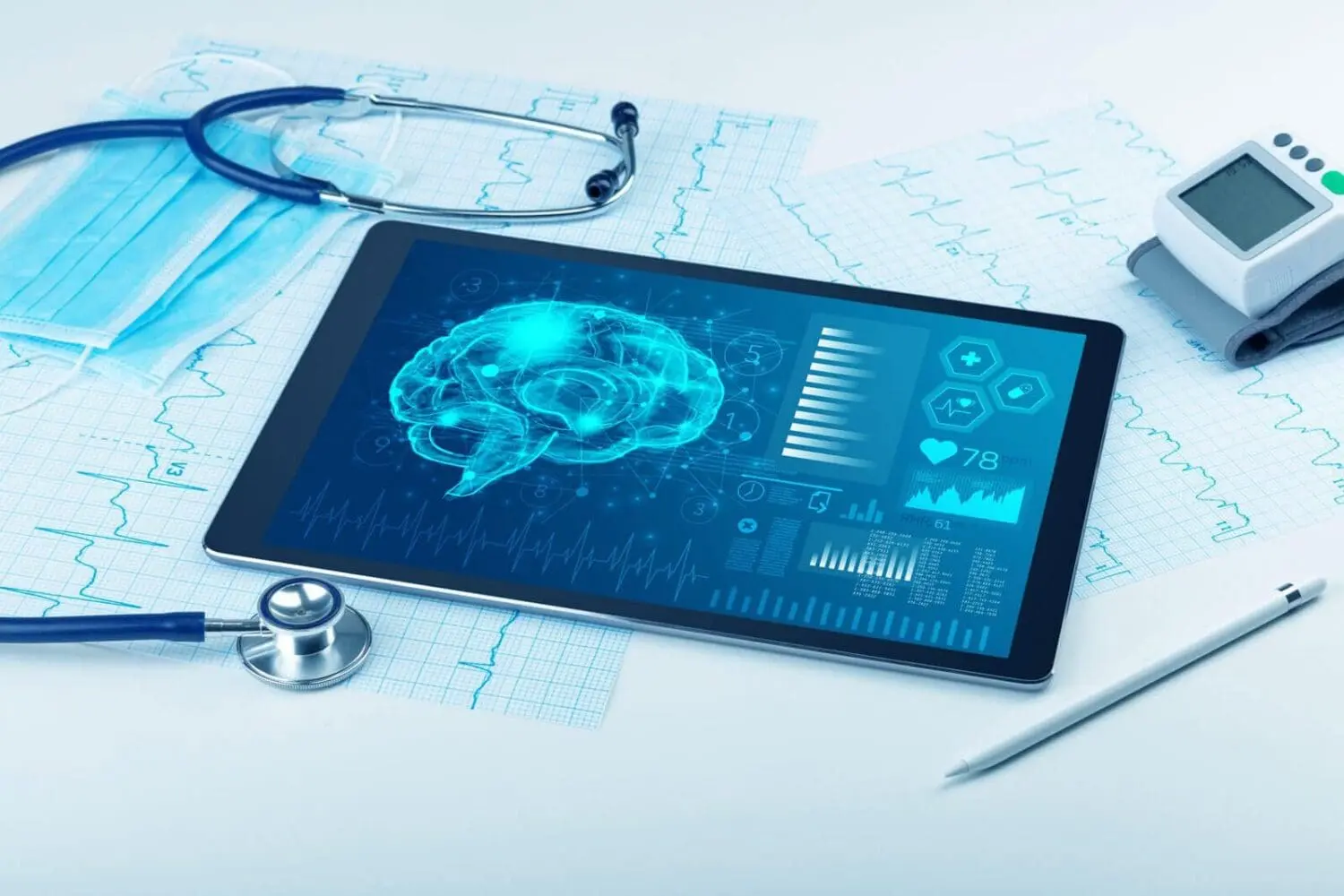 Adherent (formerly Compliance & Risks). A tablet displaying a glowing blue brain and medical data, surrounded by a stethoscope, surgical masks, ECG papers, a blood pressure monitor, and a stylus.