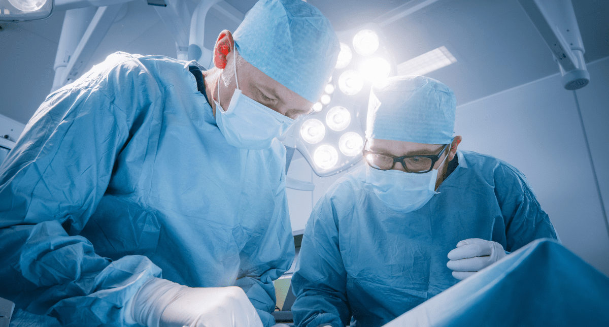 Adherent (formerly Compliance & Risks). Surgeons in operating theatre - concept for Survey on Electronic Instructions For Use (eIFUs) for Medical Devices