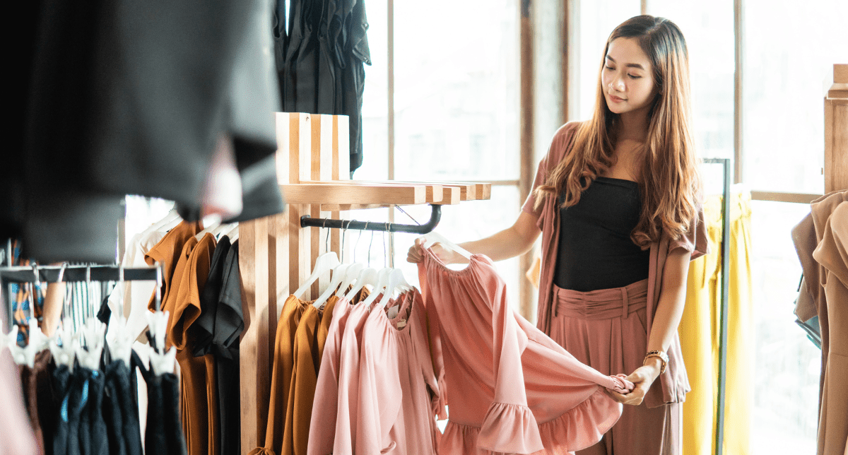 Adherent (formerly Compliance & Risks). Woman shopping for clothes - concept for textiles regulations