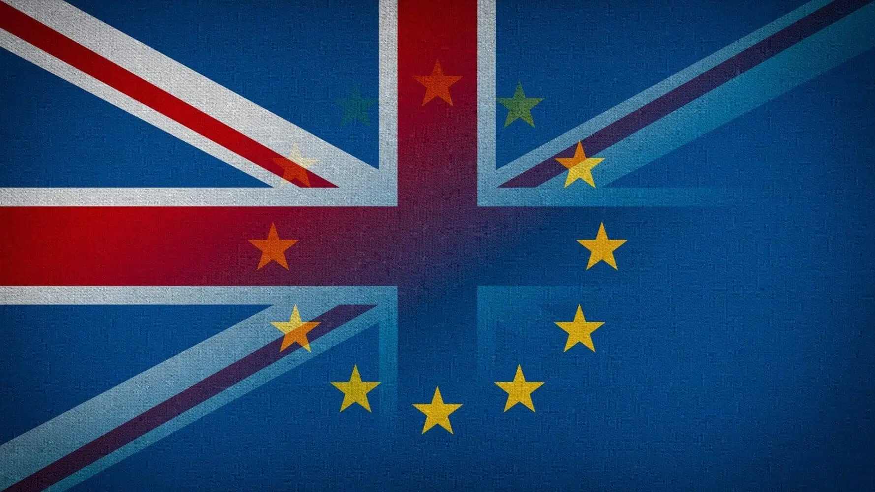 Adherent (formerly Compliance & Risks). A blended image of the Union Jack and the European Union flag, showing an overlap of their designs.