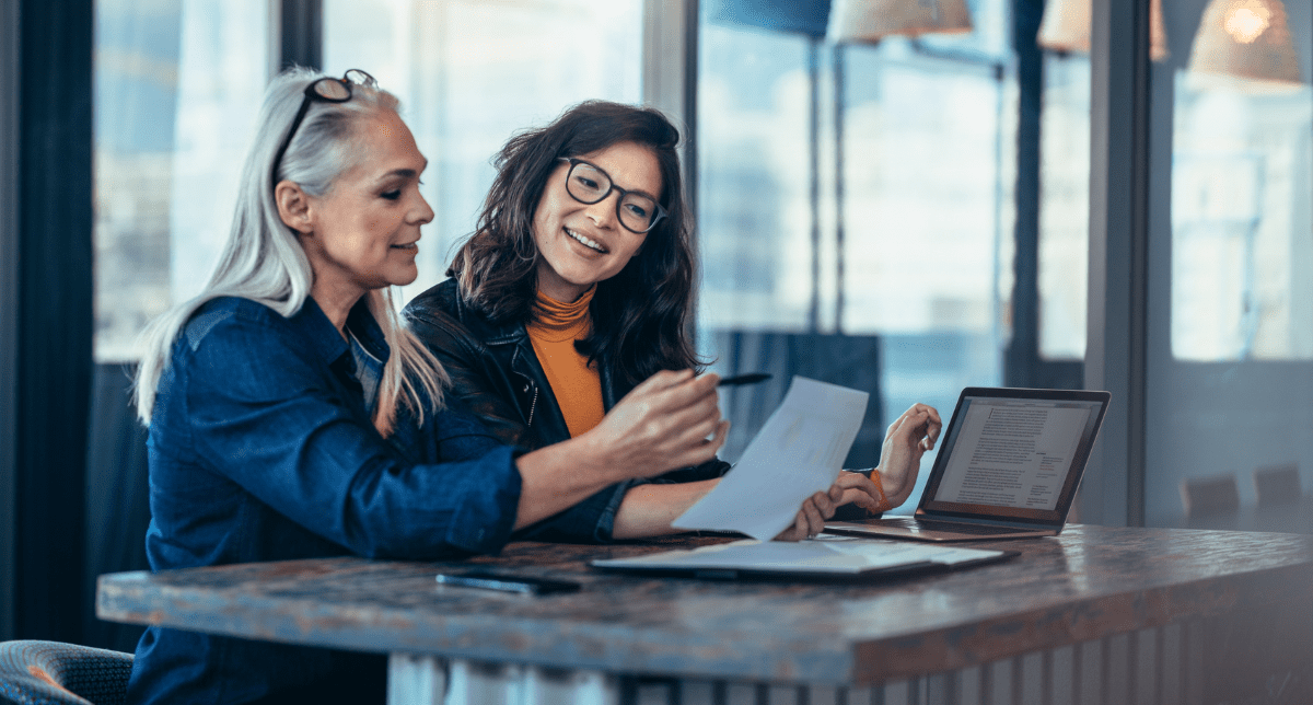 Adherent (formerly Compliance & Risks). two women analyzing documents in office - concept for compliance trends july 2025