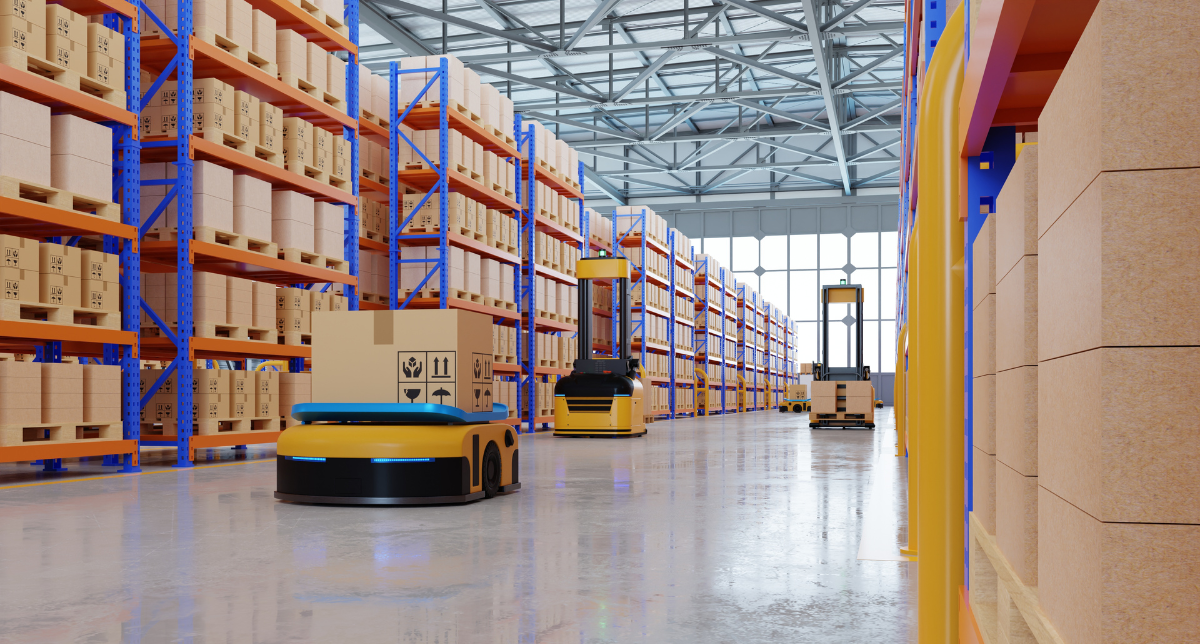 Adherent (formerly Compliance & Risks). An automated warehouse with tall racks full of cardboard boxes. An autonomous mobile robot carries a box in the foreground, while automated forklifts are visible further down the aisle.