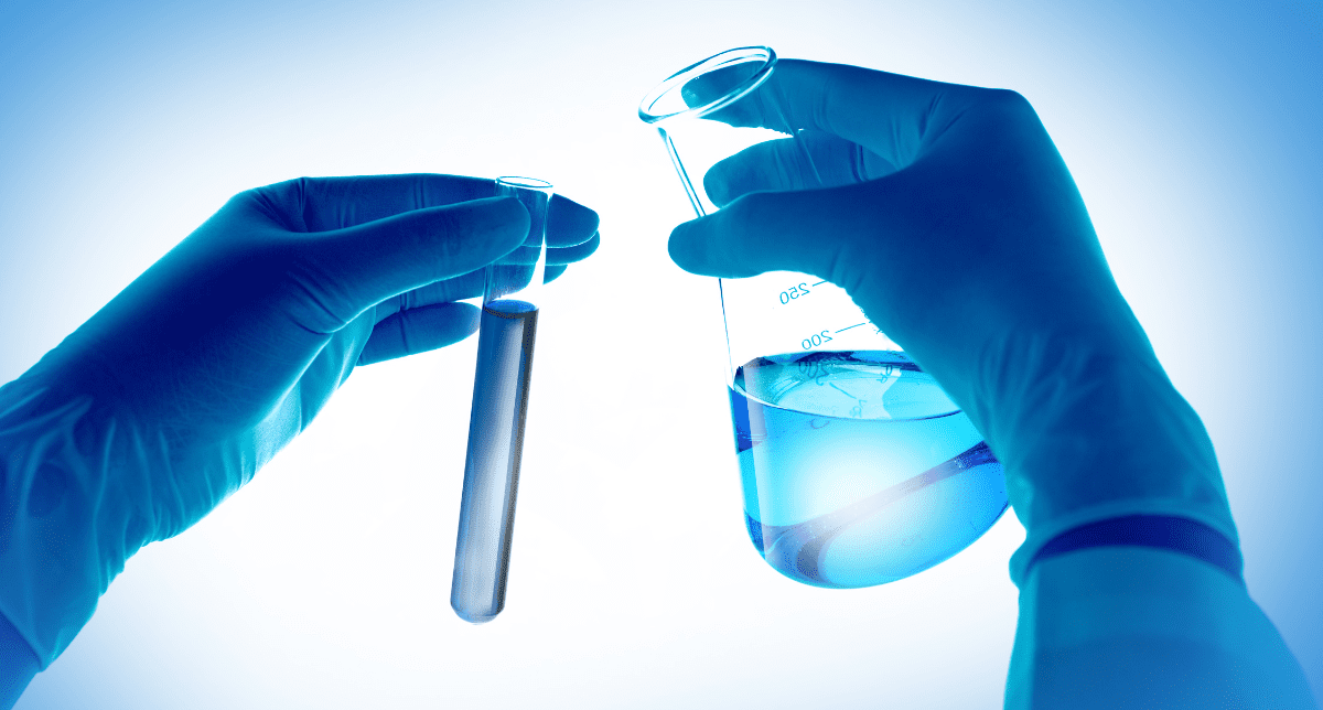 Hand holding lab equipment - concept for PFAS restrictions