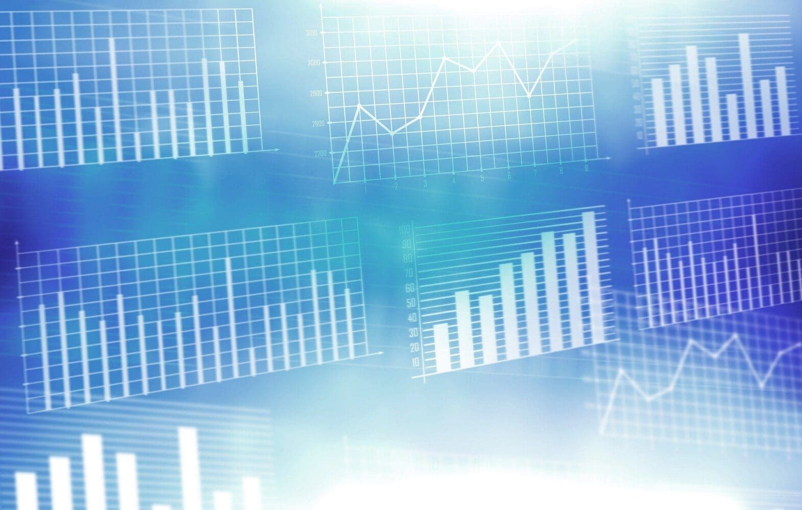 Multiple white bar and line graphs on a blue digital background with light flares.