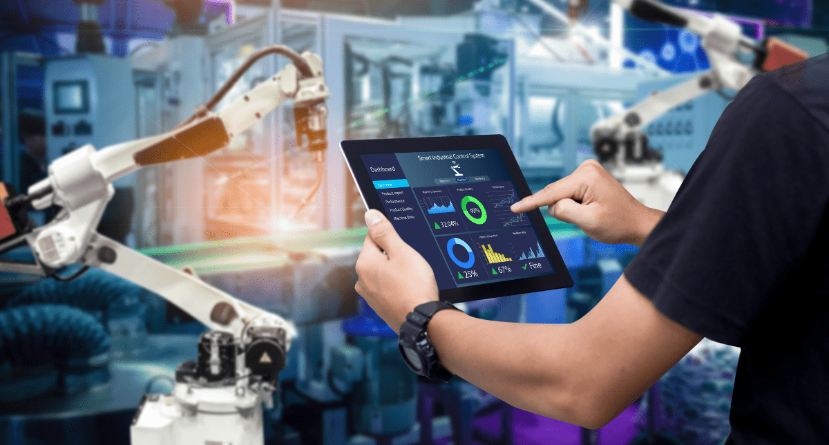 Hands holding tablet for automation machinery - concept for Industrial Machinery Regulation