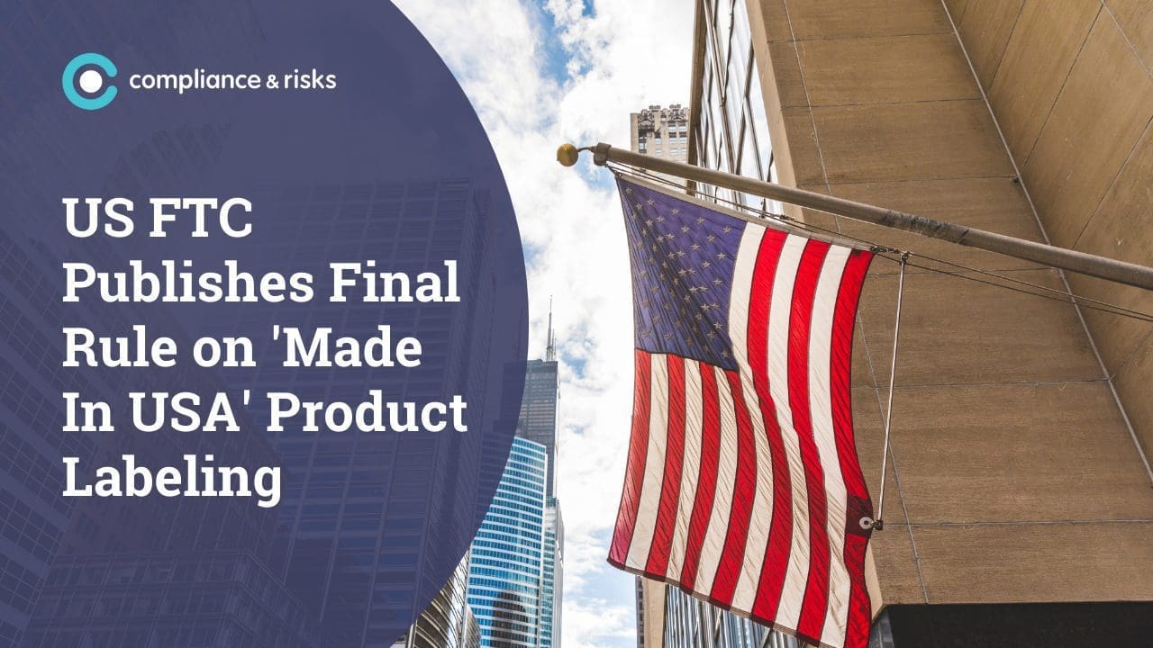 An American flag hangs from a building, with skyscrapers and a blue sky in the background. Overlay text reads 'US FTC Publishes Final Rule on 'Made In USA' Product Labeling' with the 'compliance & risks' logo.