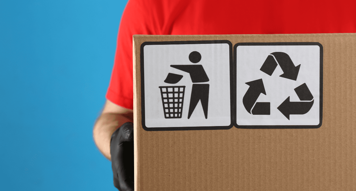 Person holding package with recycling and waste symbols - concept for Packaging EPR