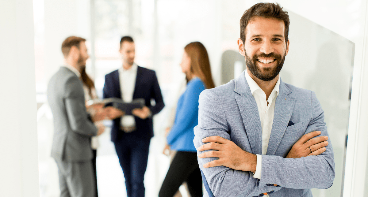 Professionals in office setting - discussing compliance trends July 2024