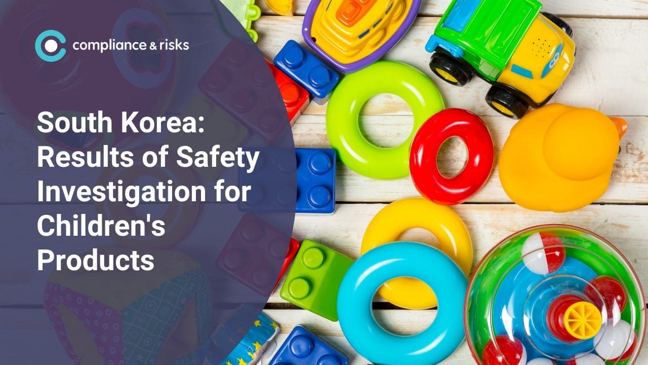 A flat lay of colorful children's toys on a wooden background, partially covered by a dark blue overlay with white text: 'South Korea: Results of Safety Investigation for Children's Products' and the 'compliance & risks' logo.