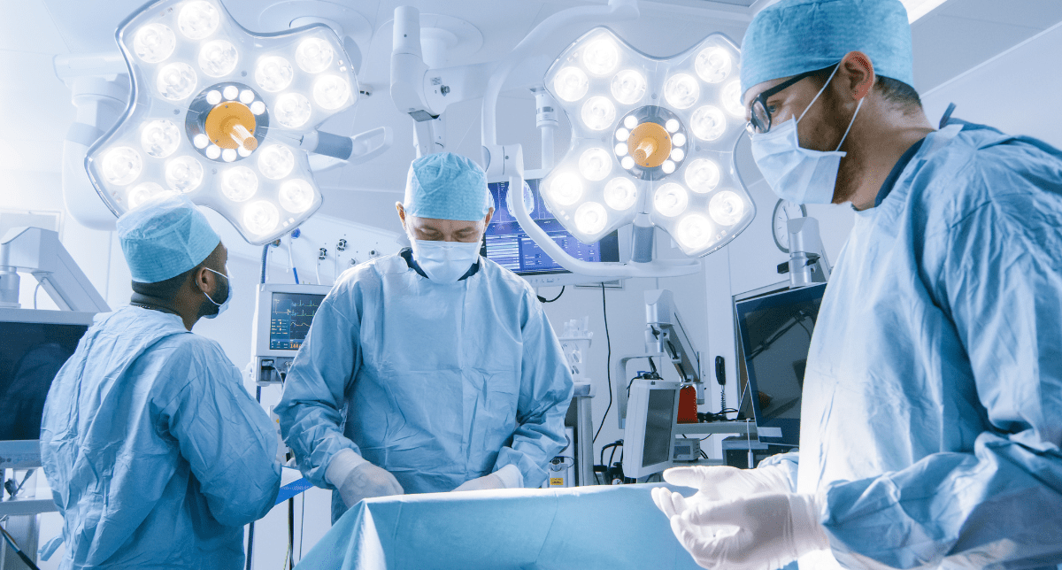 surgeons in operating theatre - concept for medical technology